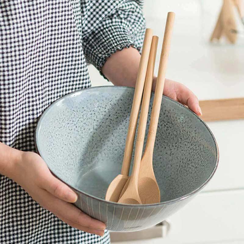 bamboo utensils in a bowl