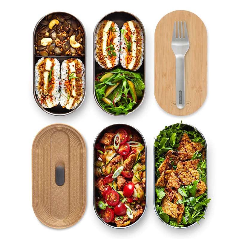 stainless steel bento box with food inside