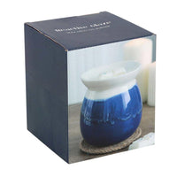 blue ceramic oil burner in cardboard packaging