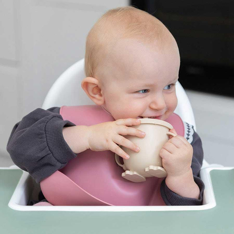 baby wearing a silicone baby bib