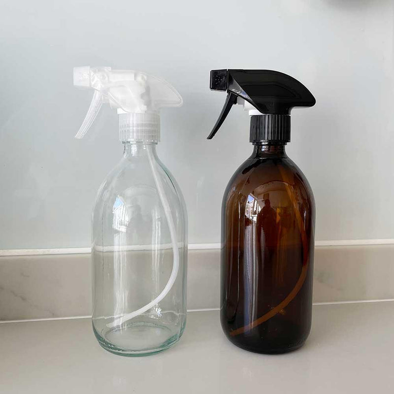 glass trigger spray bottles on kitchen side