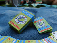 social responsibility card game on a blanket being played
