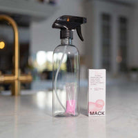 mack eco fabric freshener in glass bottle