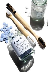 adult bamboo toothbrush with toothpaste tablets