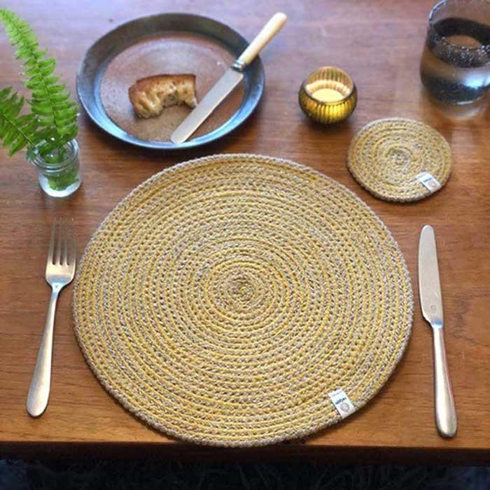 yellow jute table mat on a kitchen table