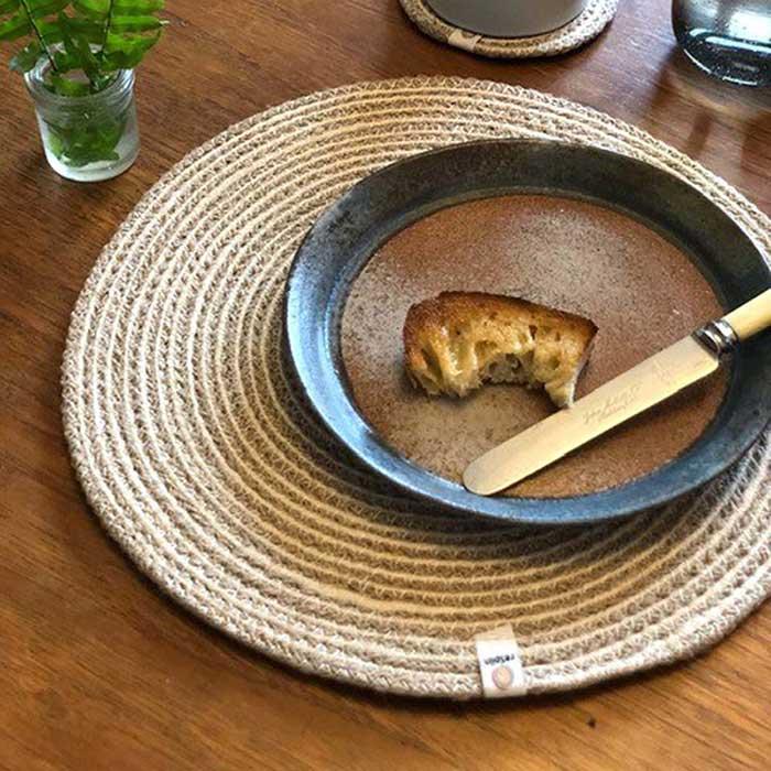 jute table mat on a table with bowl on it