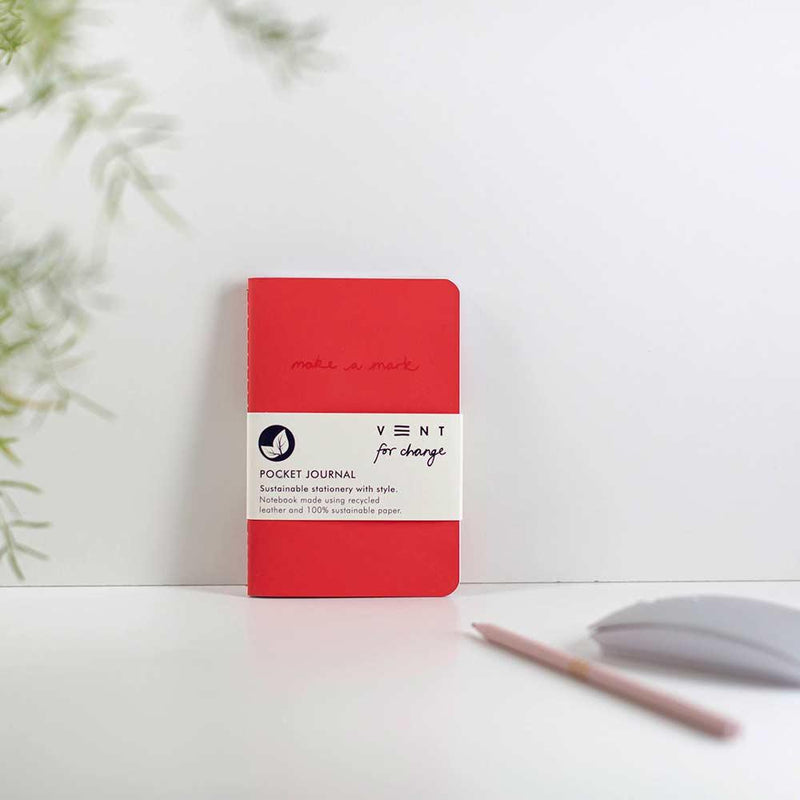 recycled leather pocket journal in red on a desk
