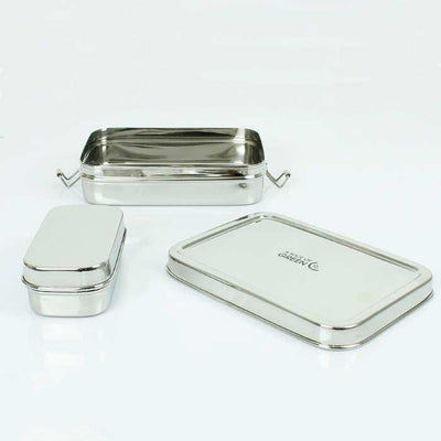 lunch box with mini container on a kitchen table top