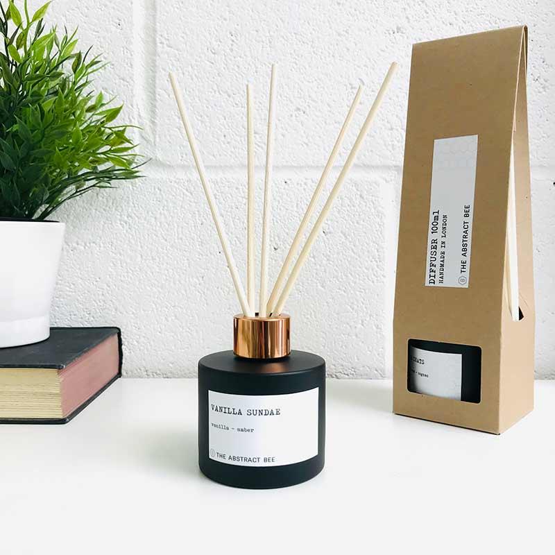 vanilla reed diffuser next to packaging