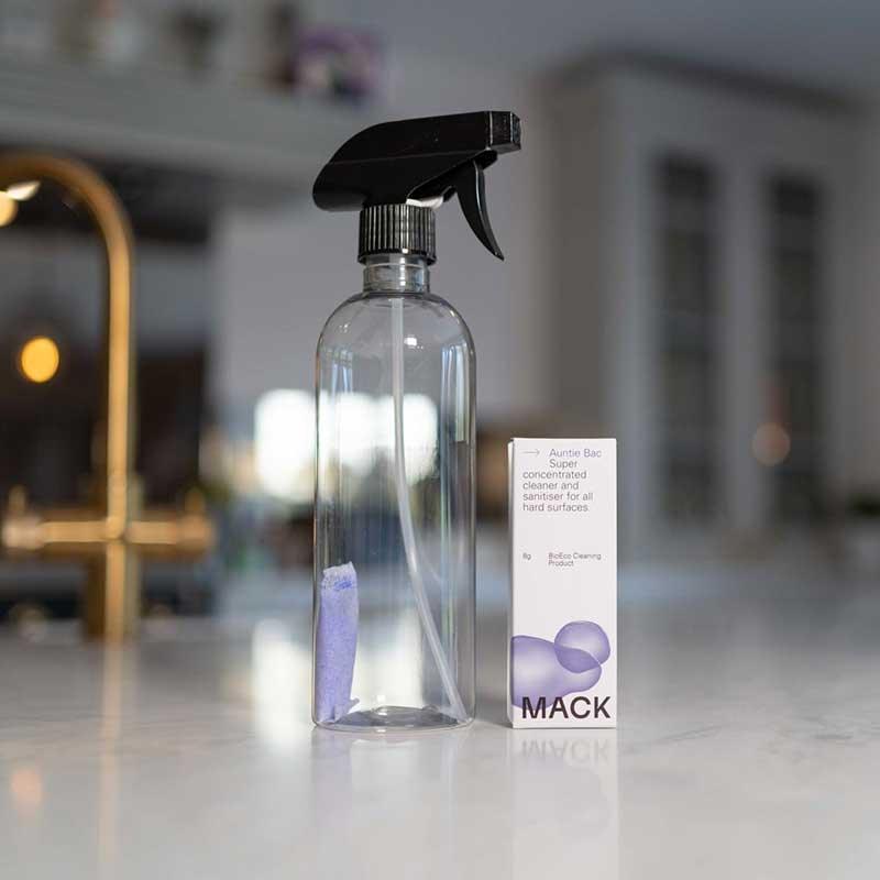 mack eco antibacterial cleaner refill in glass bottle