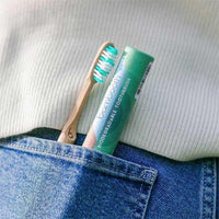 bambooth toothbrushes in back pocket