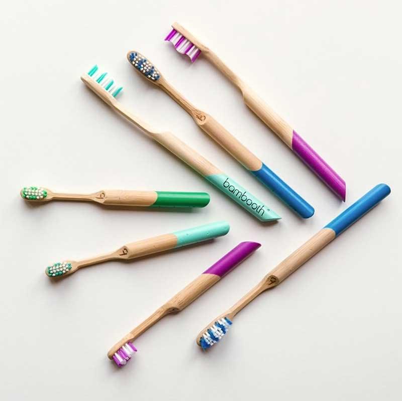 wooden bambooth toothbrushes on kitchen side