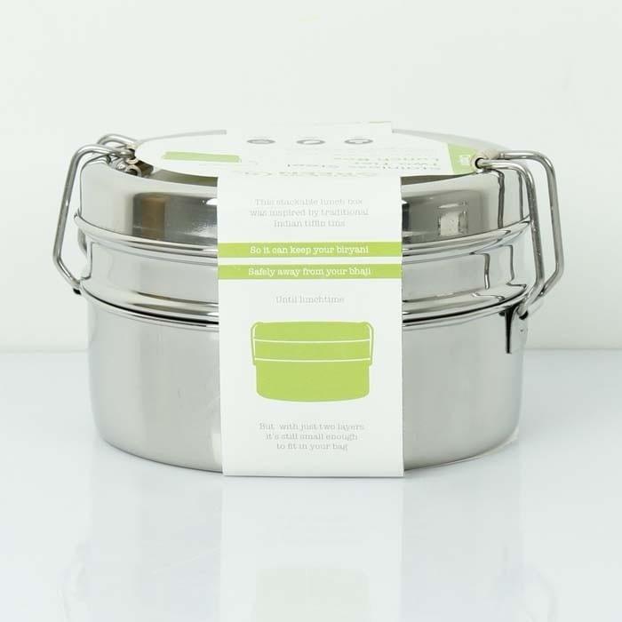 round stainless steel lunch box in cardboard packaging