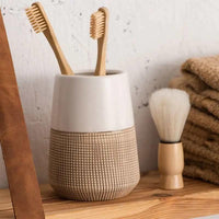 bamboo toothbrushes in bathroom
