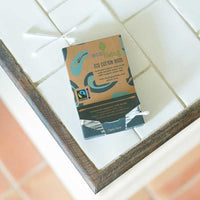 ecoliving organic cotton buds on a bathroom side