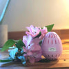 ecoegg laundry egg next to a pink flower