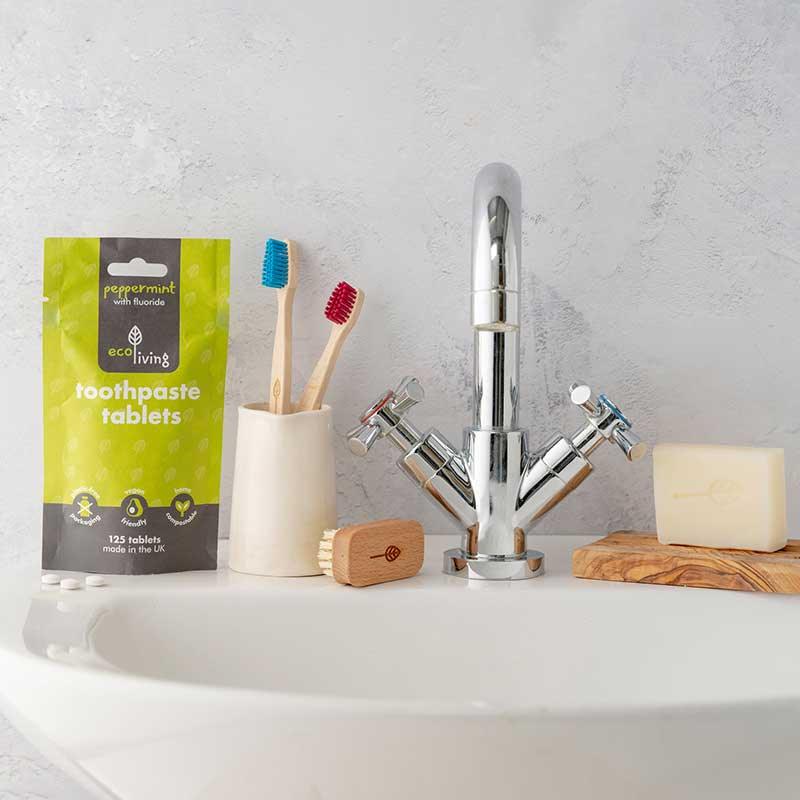 ecoliving toothpaste tablets in a bathroom