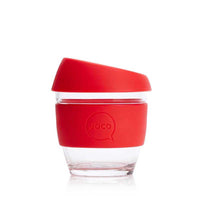 glass coffee cup with red lid
