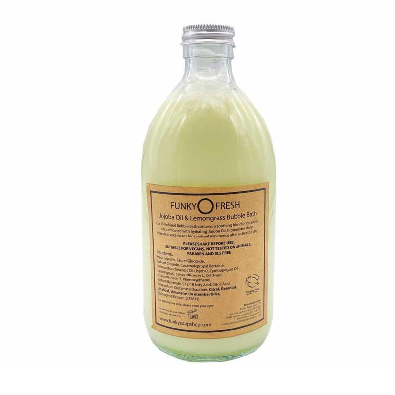 jojoba oil and lemongrass bubble bath in glass bottle