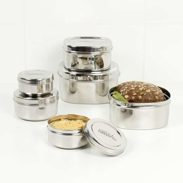square stainless steel containers spread across table