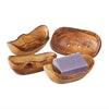4 wooden soap dishes on white background