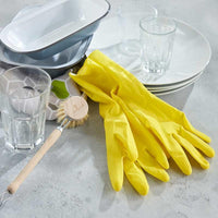 natural latex rubber gloves on kitchen top