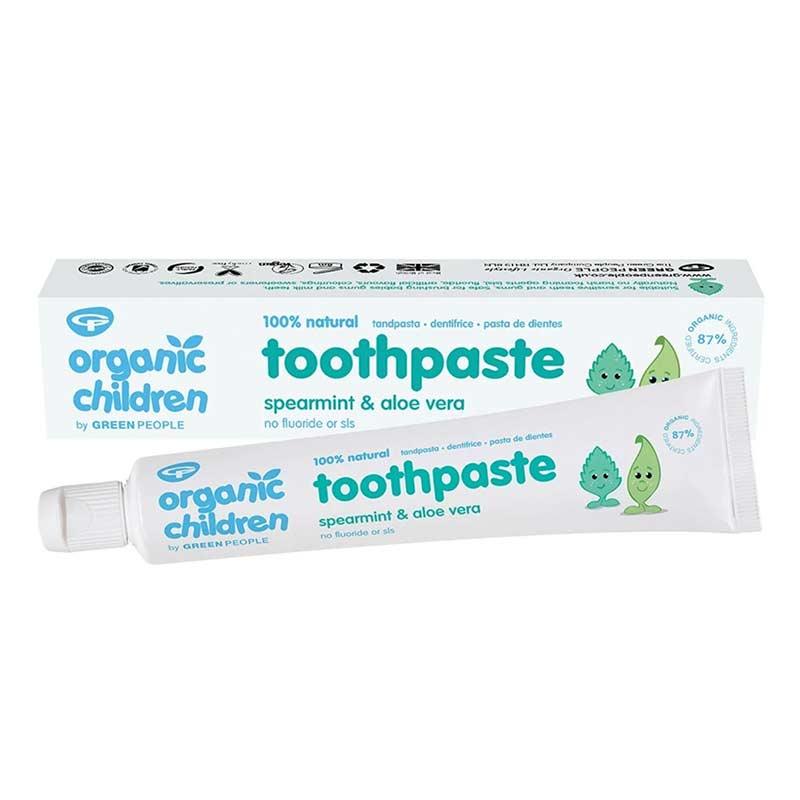 kids natural toothpaste next to packaging