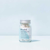 brushd toothpaste tablets in a glass jar