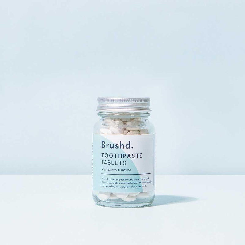 brushd toothpaste tablets in a glass jar
